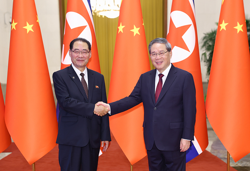 李强同朝鲜内阁总理朴泰成会谈